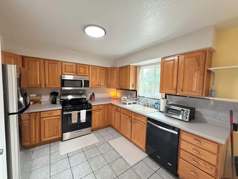 Full Kitchen with everything needed for short term and long term stays!