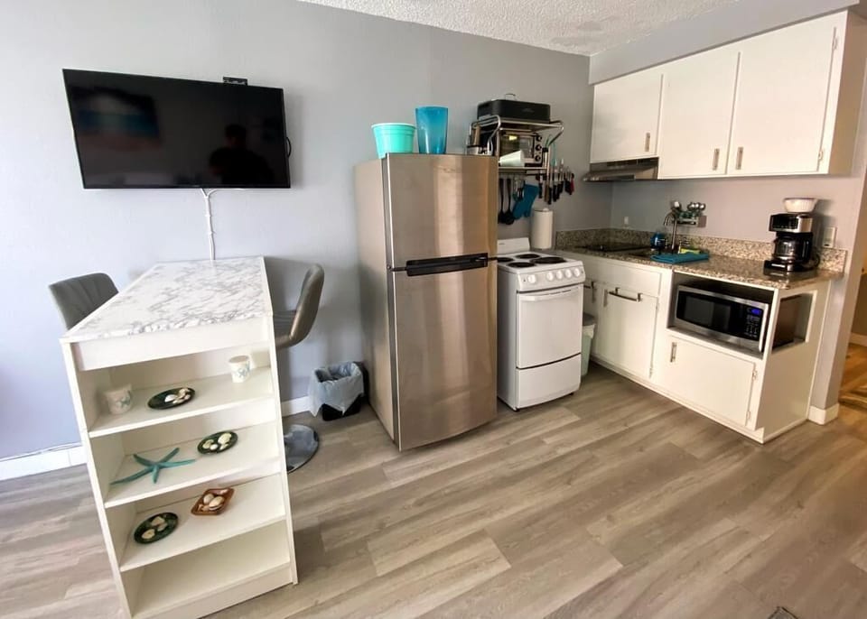 Your cozy kitchen awaits with all the essentials.
