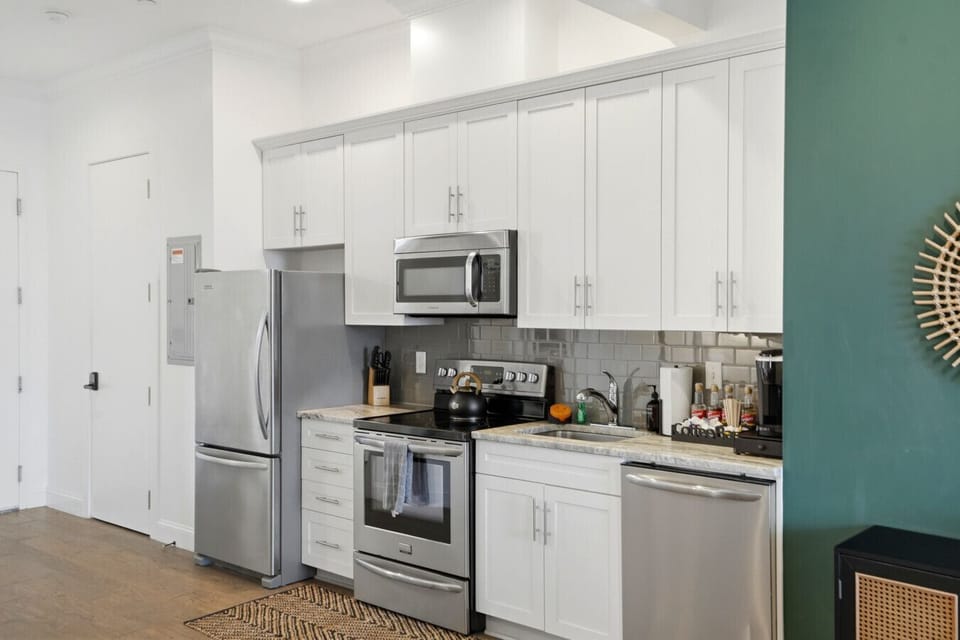 Fully equipped kitchen with stainless steel appliances