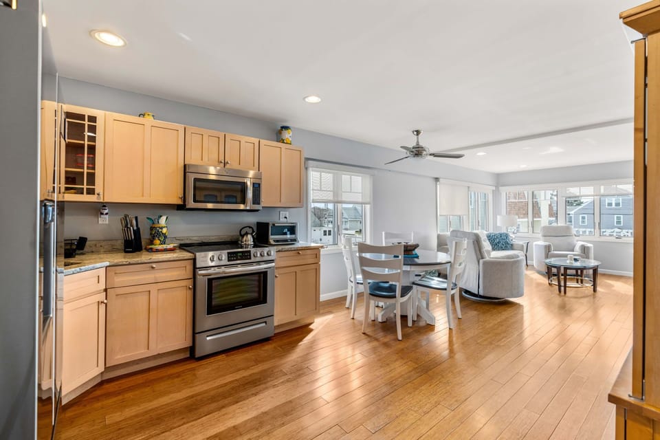Open concept living area and kitchen. Fully equipped with all major appliances, including a dishwasher.