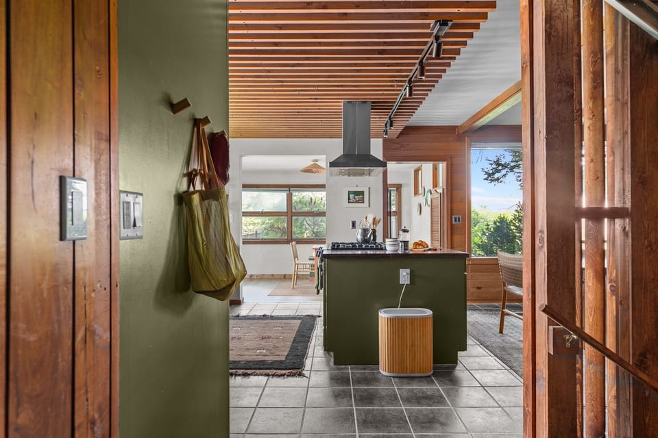 The kitchen area features an air purifier to keep the space feeling fresh and comfortable
