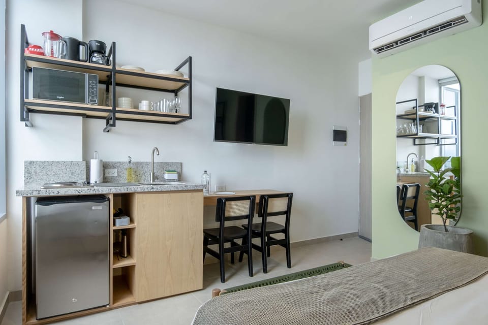 Compact kitchenette with wooden finishes