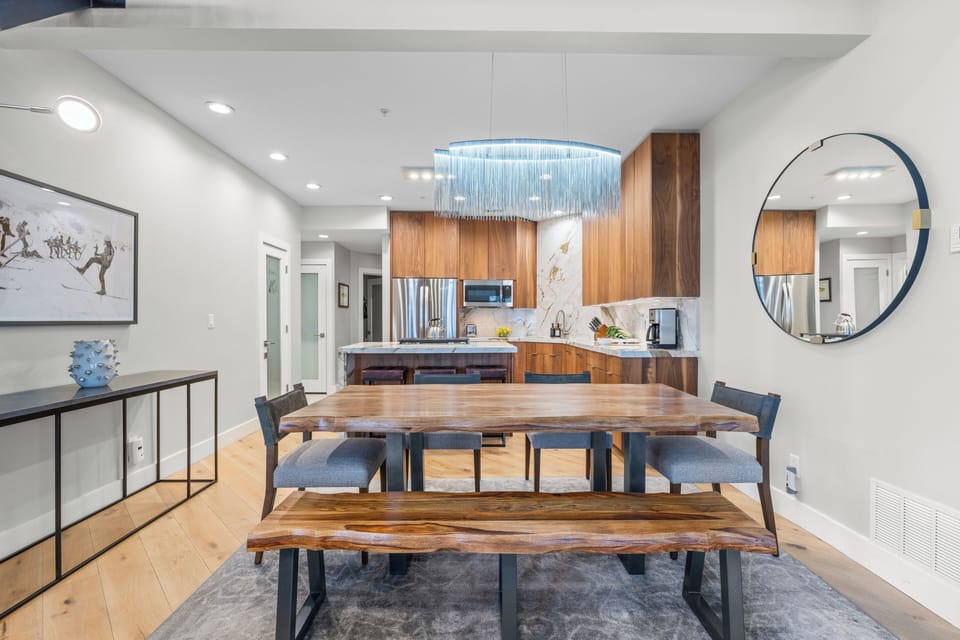 Kitchen and dining area with modern appliances.