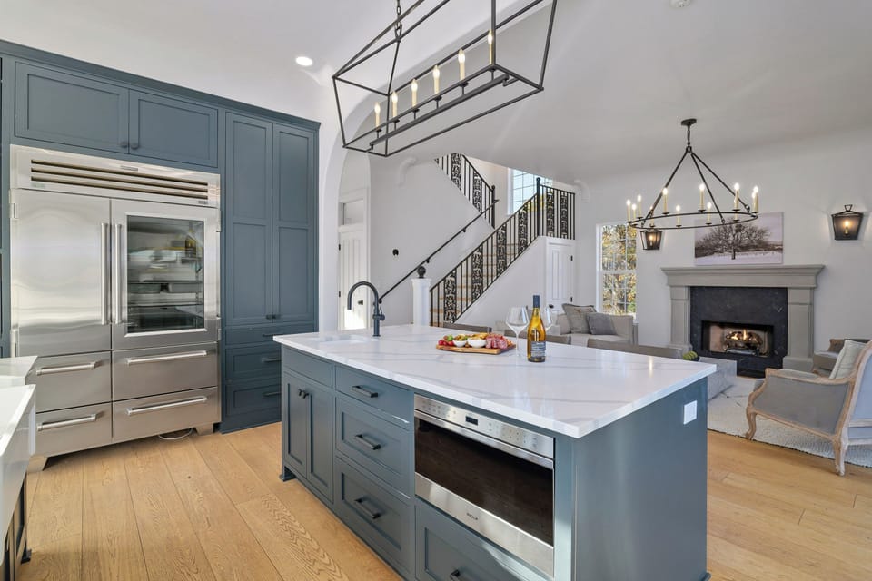 Designed for the discerning guest. Enjoy top-tier appliances, including a professional built-in refrigerator and integrated drawer microwave. This island is the heart of the home, combining high-end design with ultimate functionality.