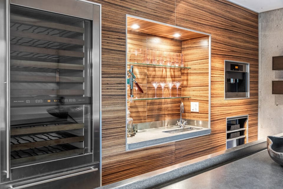 Elegant Kitchen featuring Wine Storage Beautiful Wood Cabinets and Modern Design Elements