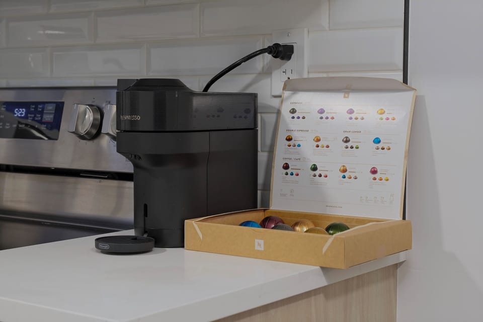 Enjoy a Nespresso coffee with a variety of complimentary pods provided.
