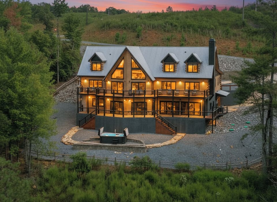 Dusk shot of the High River Lodge, an ultra-luxury, family-sized cabin rental in North Georgia 