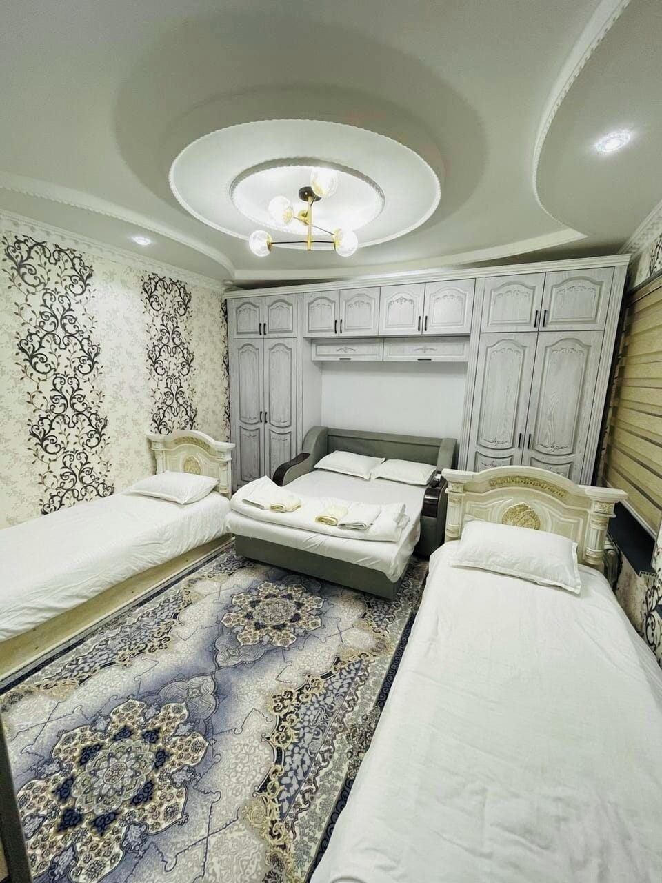 Deluxe Quadruple Room, Patio | Iron/ironing board (on request), WiFi (free)