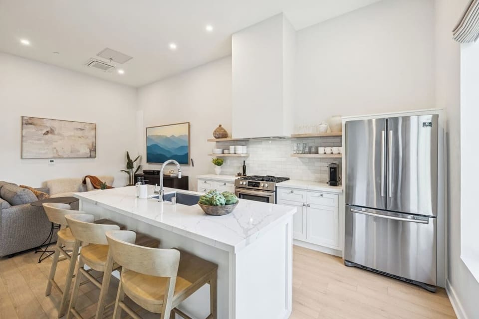 Full kitchen: Nespresso, fridge, stove/oven, plates and utensils, dishwasher