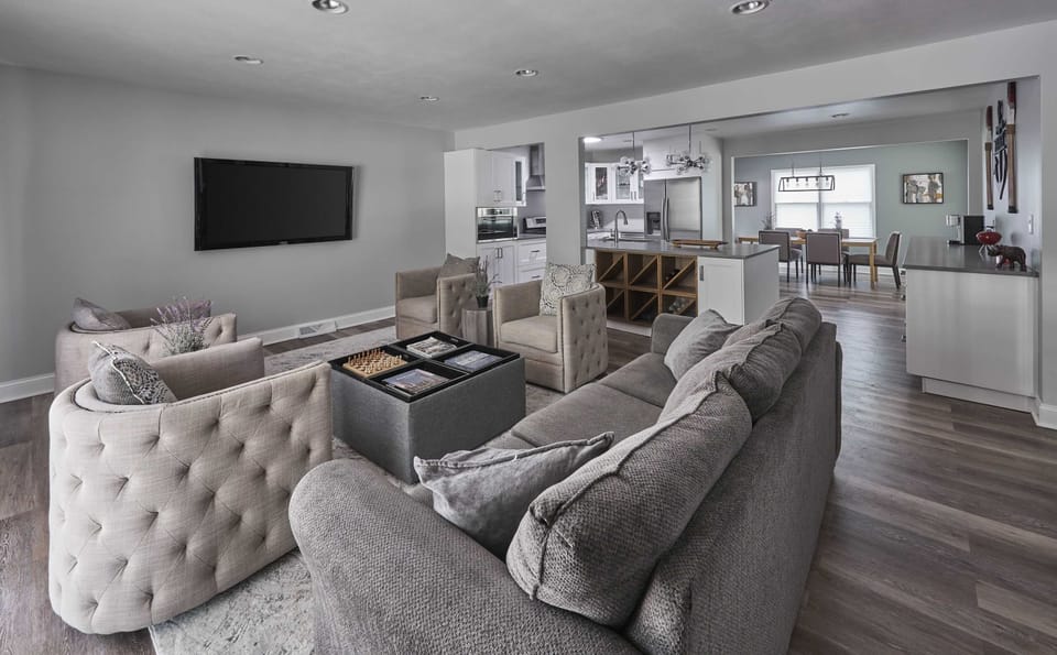 Curl up in the chic living room & stream your favorites on the smart TV​