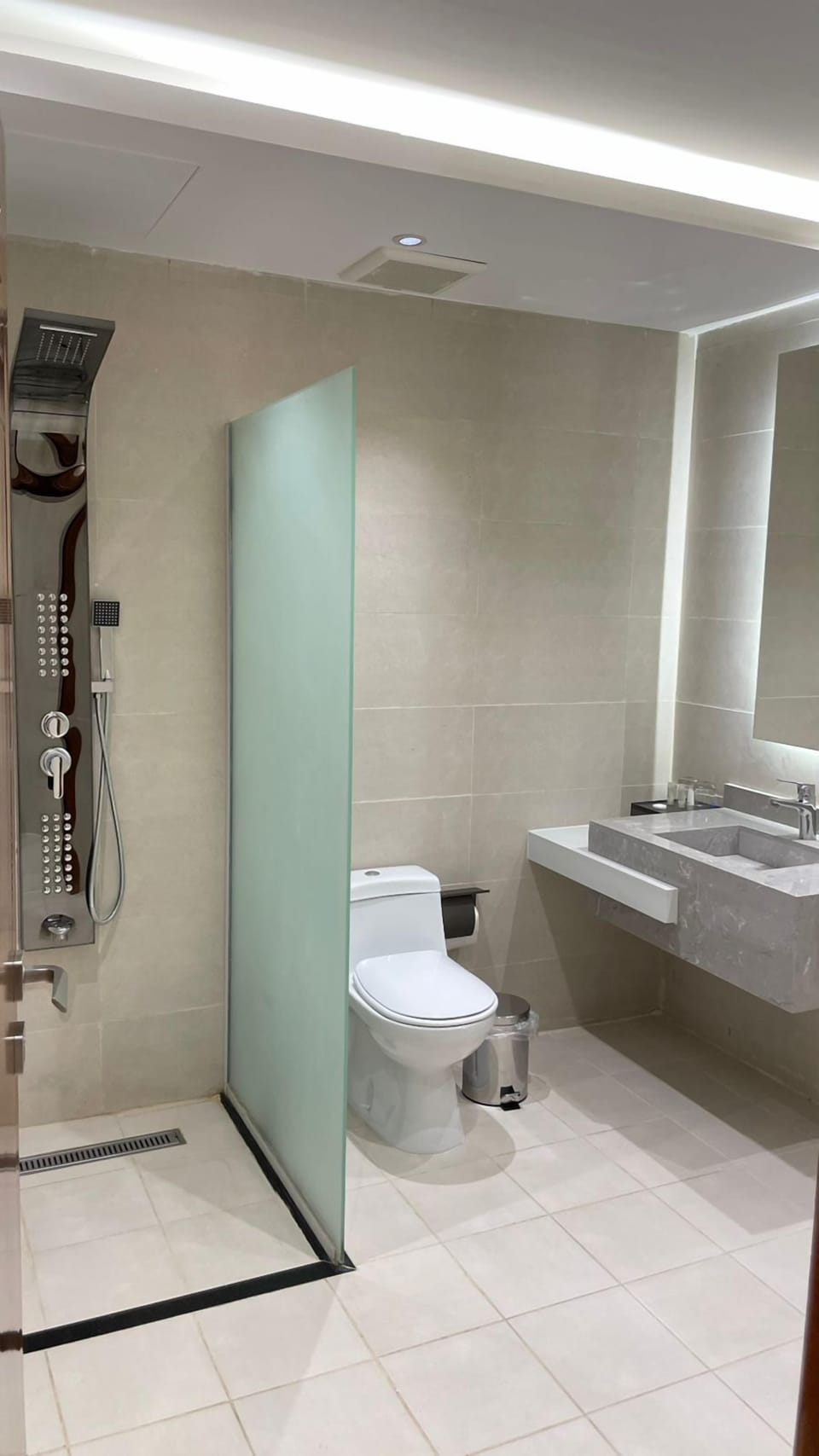 Separate tub and shower, hair dryer, bathrobes, slippers