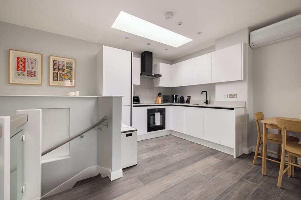 Apartment | Living area | 44-inch flat-screen TV with cable channels