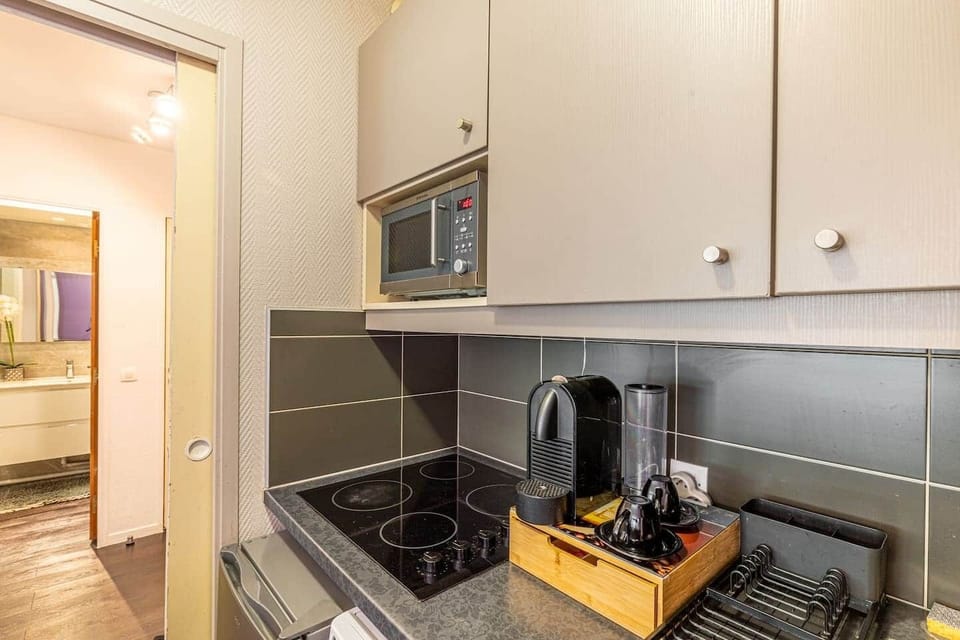 kitchen with microwave, kettle, Nespresso Coffee machine, 