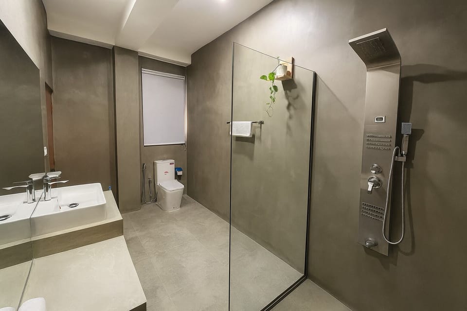 Shower, hydromassage showerhead, eco-friendly toiletries, hair dryer