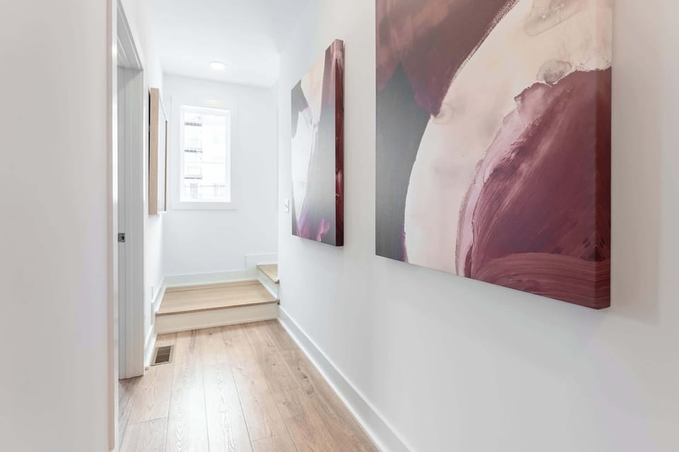Step into a world of elegance with this chic hallway, inviting you to explore more of our Nashville Luxury Vacation Homes. Perfect for your next group getaway. Book your stay today with Misfit Homes and experience the heart of Music City!