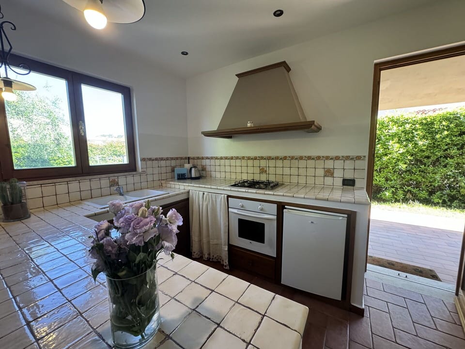 Wood, Flooring, Kitchen, Interior Design, Floor, Furniture, Countertop, Kitchen Appliance, Tile, Kitchen & Dining Room Table