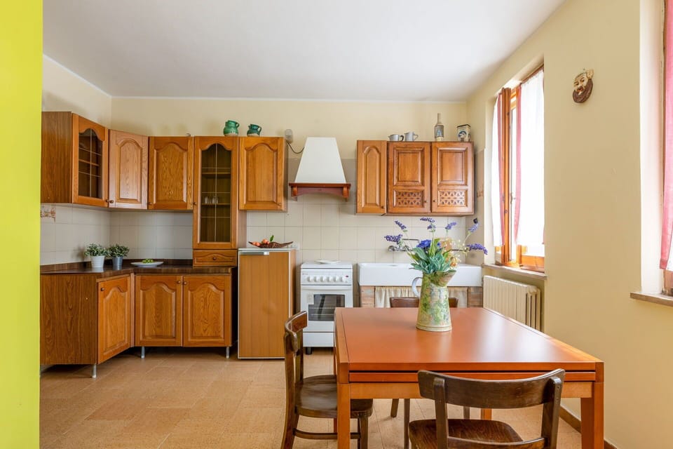 Furniture, Wood, Flooring, Interior Design, Floor, Kitchen, Cabinetry, Kitchen & Dining Room Table, Lighting, Room