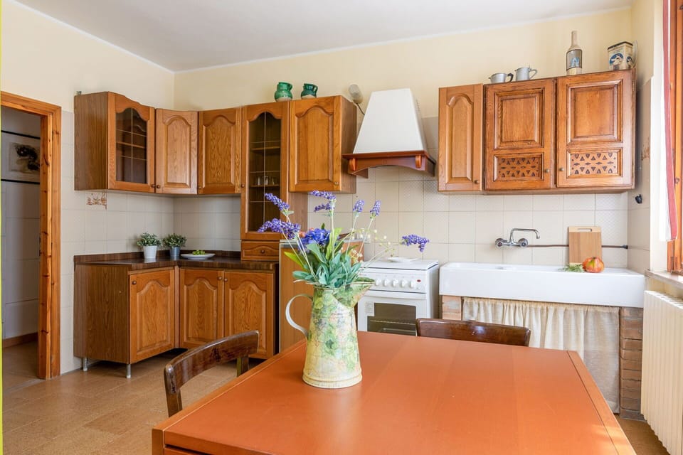 Furniture, Kitchen, Cabinetry, Kitchen Appliance, Countertop, Wood, Major Appliance, Interior Design, Flooring, Cupboard