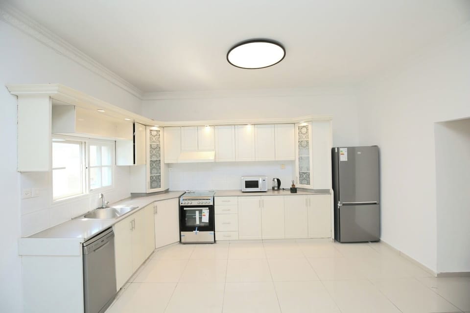 Apartment | Private kitchen | Electric kettle, highchair