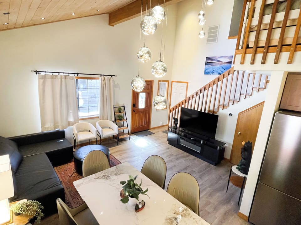 Open concept with gorgeous chandeliers!