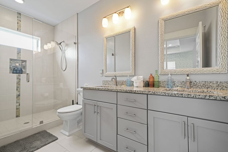 Spacious Grand Master ensuite bath with double vanity, and walk-in shower.