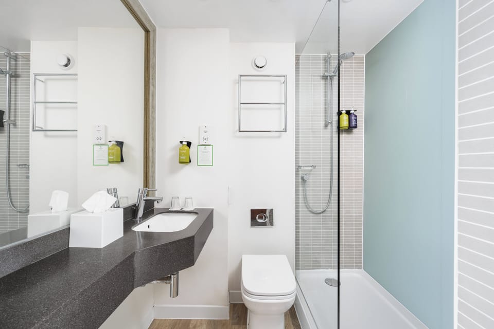 Bathtub, hair dryer, towels