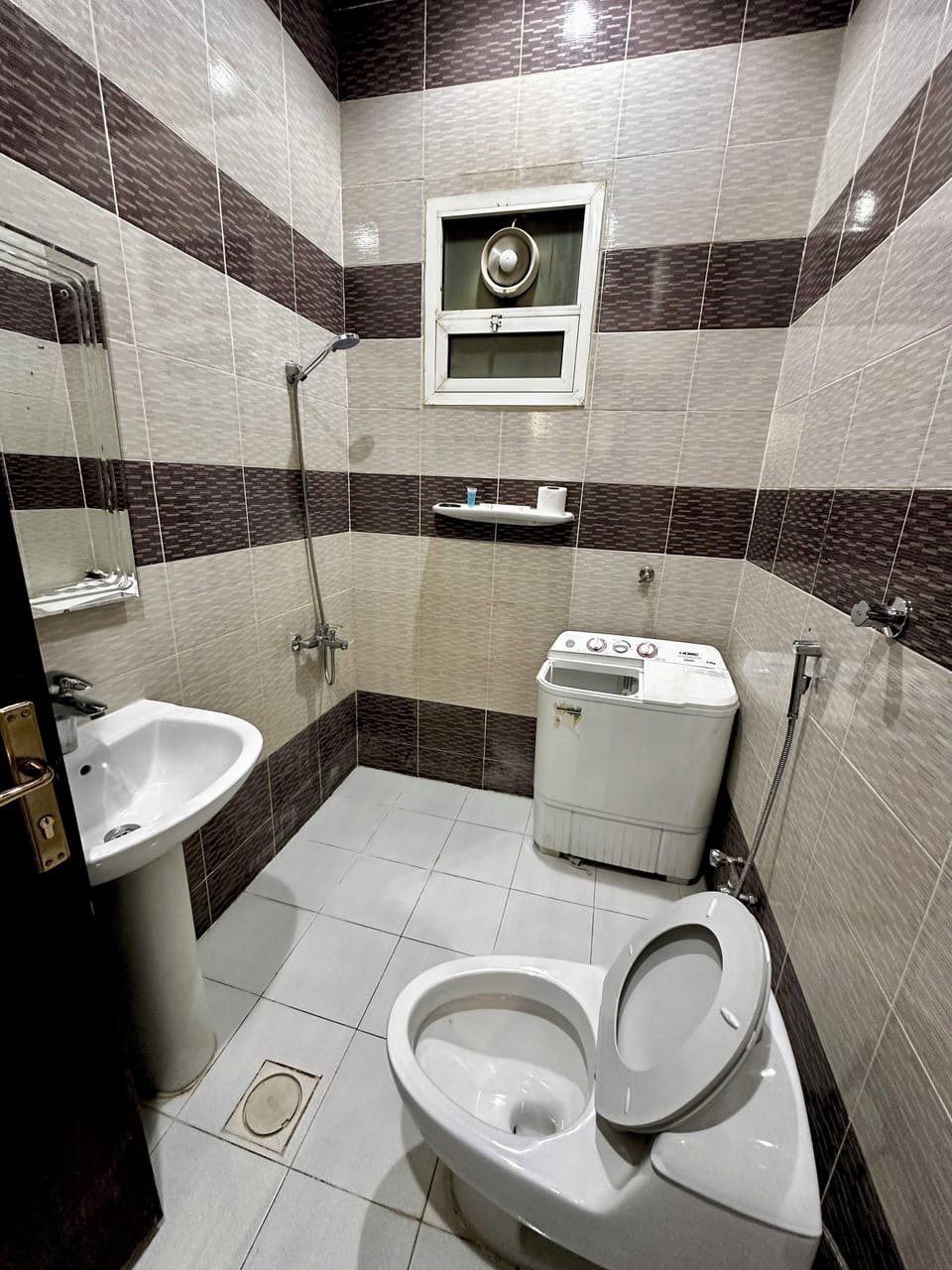 Shower, slippers, towels, soap