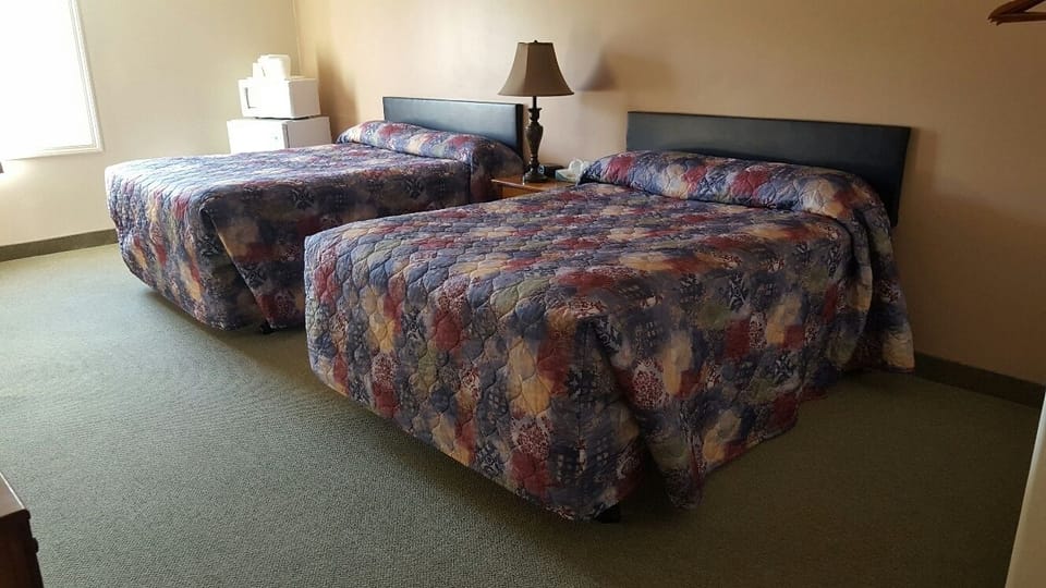 Basic Room, 2 Queen Beds, Non Smoking, City View | Blackout drapes, iron/ironing board, free cribs/infant beds, free WiFi