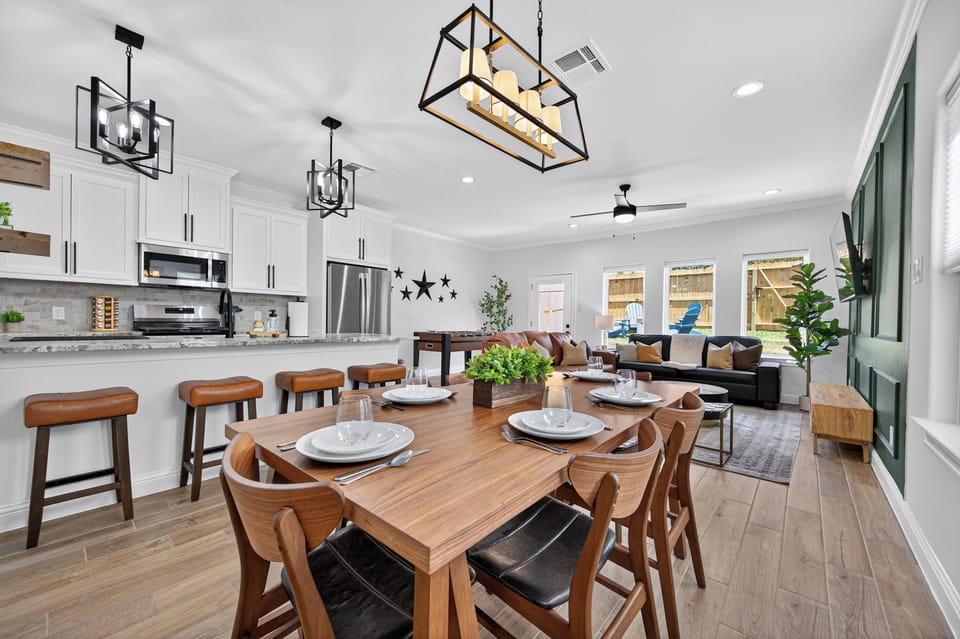 Open-concept living and dining area designed for gathering and entertaining.