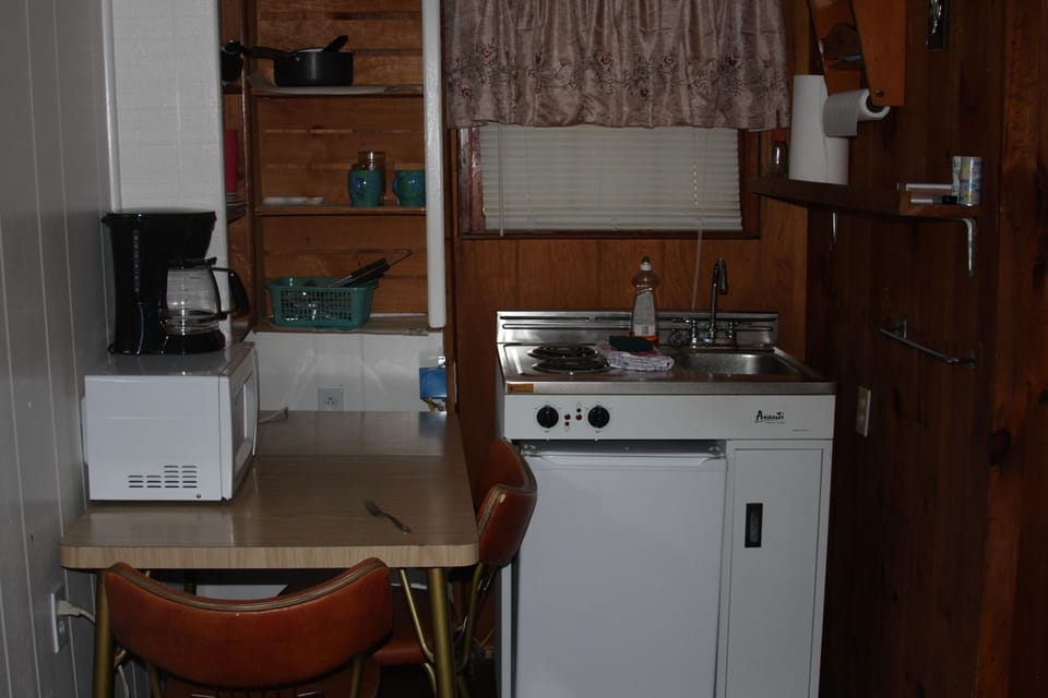 Lakefront Orange Cottage | Private kitchen | Fridge, microwave, stovetop, coffee/tea maker