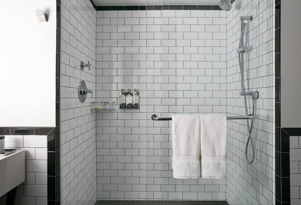 Designer toiletries, hair dryer, towels, soap