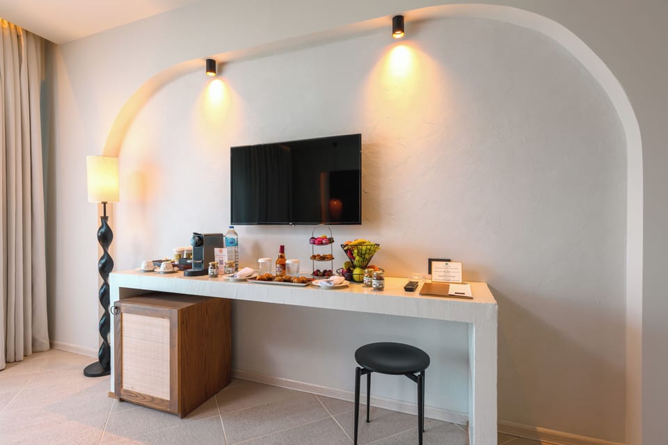 Free minibar, in-room safe, desk, laptop workspace