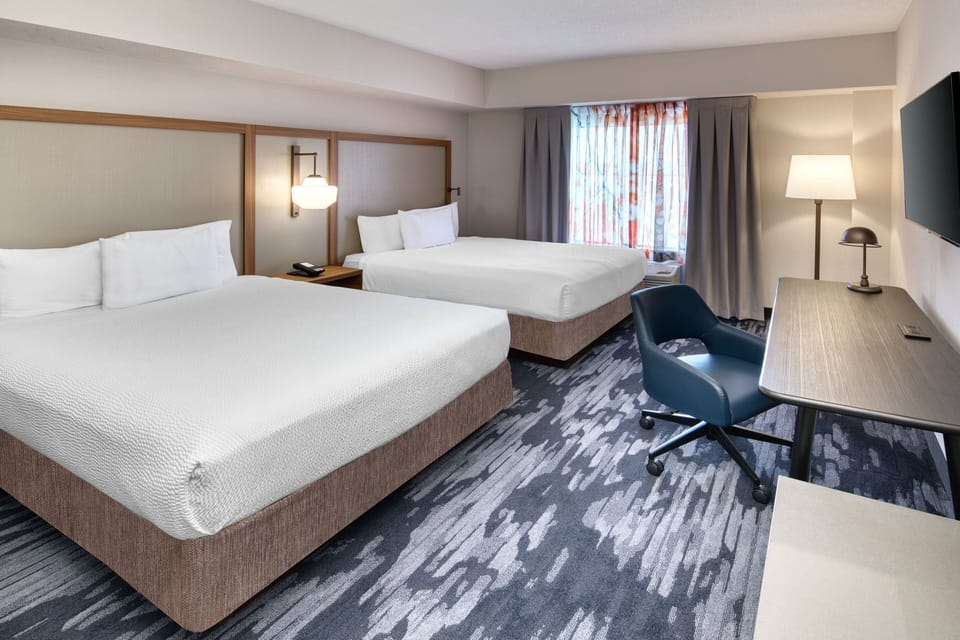 Suite, Multiple Beds | Premium bedding, desk, blackout drapes, iron/ironing board