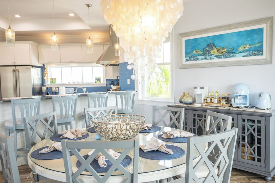 Fully-stocked chef's kitchen and dining space with gourmet coffee bar