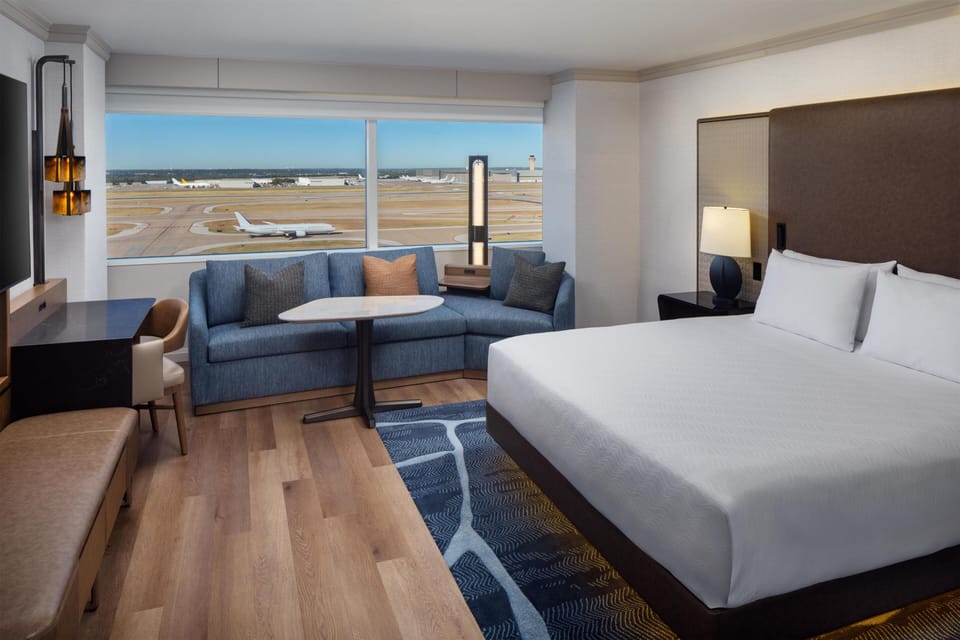 Room, 1 King Bed (Runway View) | Premium bedding, down comforters, pillowtop beds, minibar