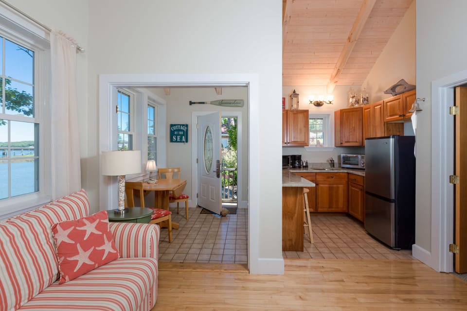 Standard Cottage, 1 Queen Bed with Sofa bed, Kitchenette, River View | Living area | Flat-screen TV