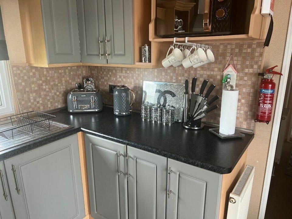 Fridge, microwave, toaster, cookware/dishes/utensils