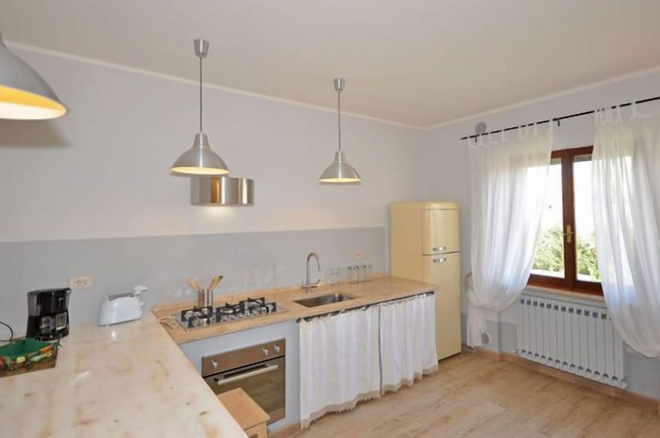 Villa, 4 Bedrooms (Villa Cassia) | Private kitchen | Fridge, microwave, oven, stovetop