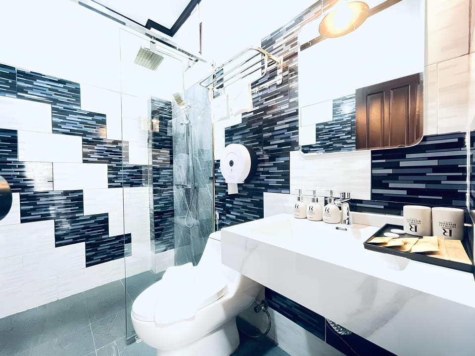 Shower, hair dryer, bathrobes, slippers