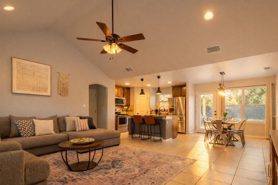 Your home away from home. A light-filled living room with a cozy, welcoming vibe
