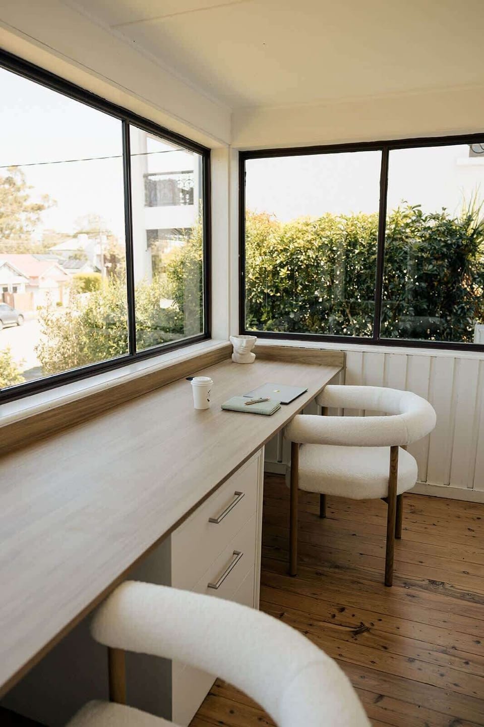 Spacious home office for two, with closing door for privacy. Bright, light-filled space overlooking Throsby Creek – perfect for working remotely.