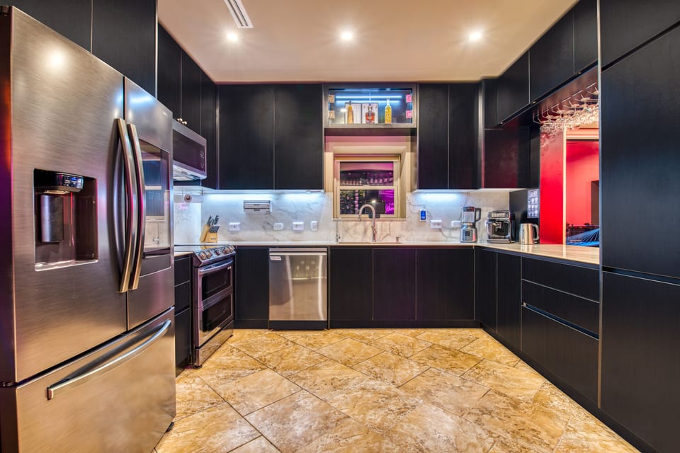 Kitchen Modern & Fully Equipped with a View of the Beach Book Now!