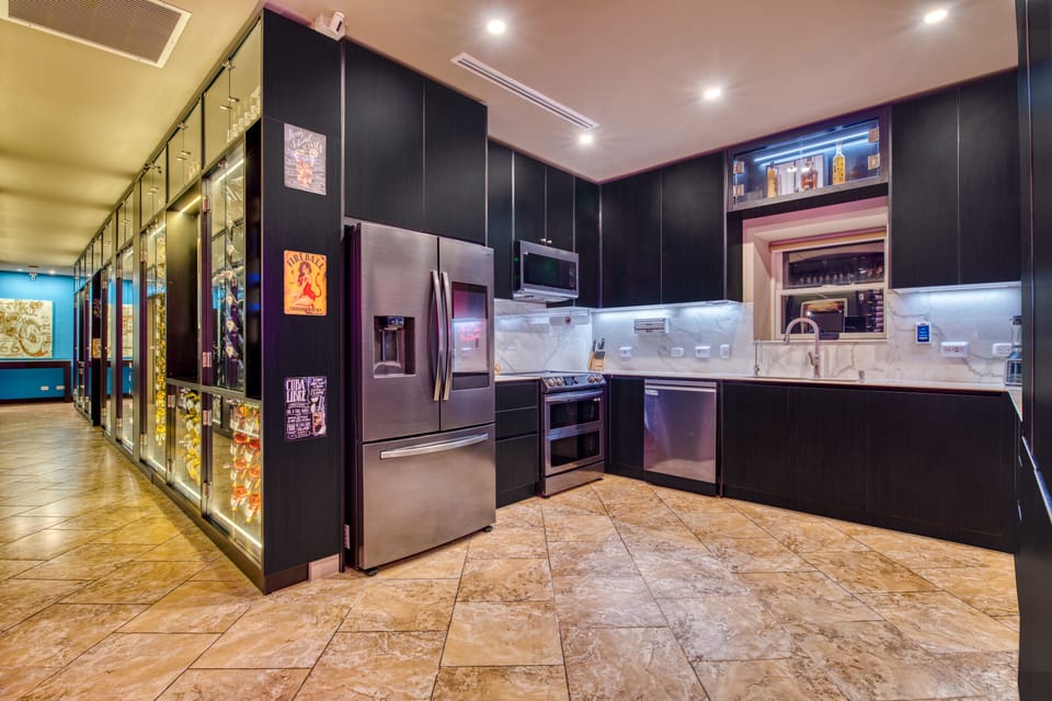 Modern State of the Art Kitchen beside Wine Cellar with 1000 Bottles of Wine!