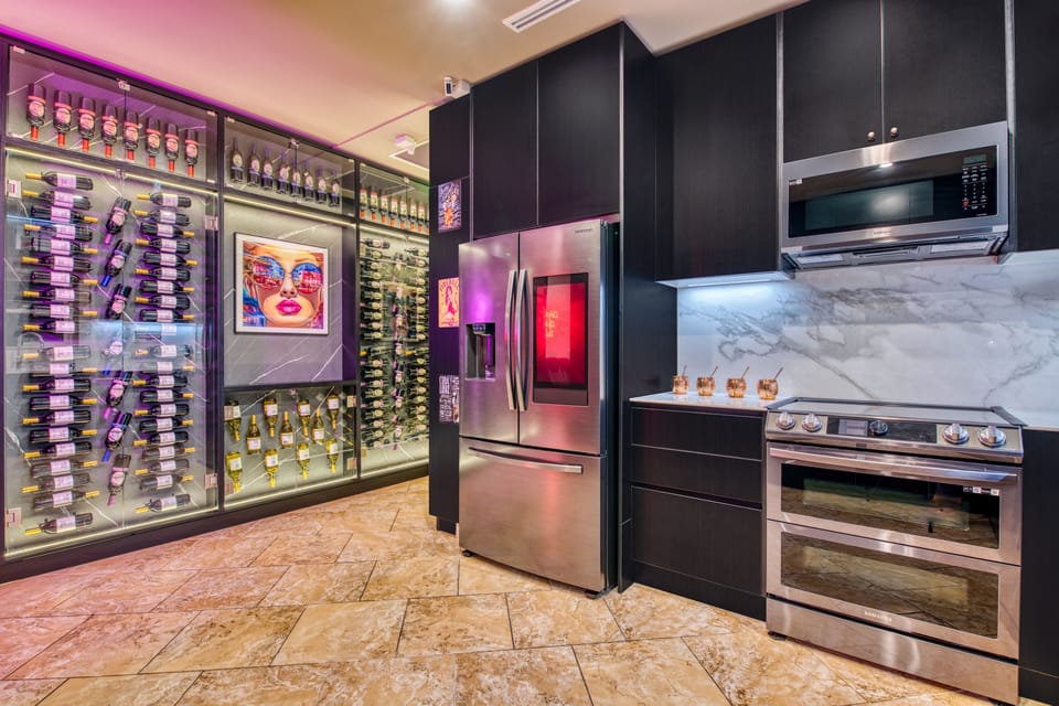 Modern State of the Art Kitchen beside 1000 Bottles of Wine. Book Now!