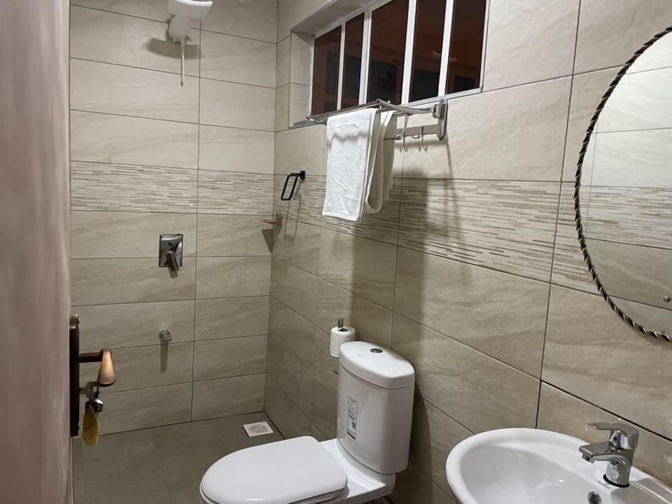 Shower, slippers, towels, soap