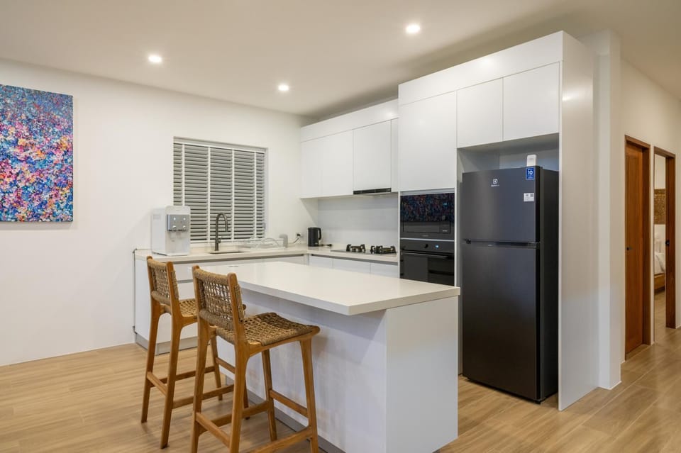 Villa, Patio, Sea View | Private kitchen | Electric kettle, toaster, dining table