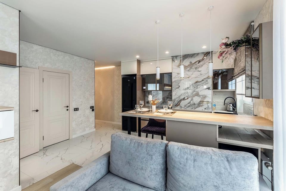 Comfort Apartment, Balcony, City View | Living area | 40-inch flat-screen TV with digital channels