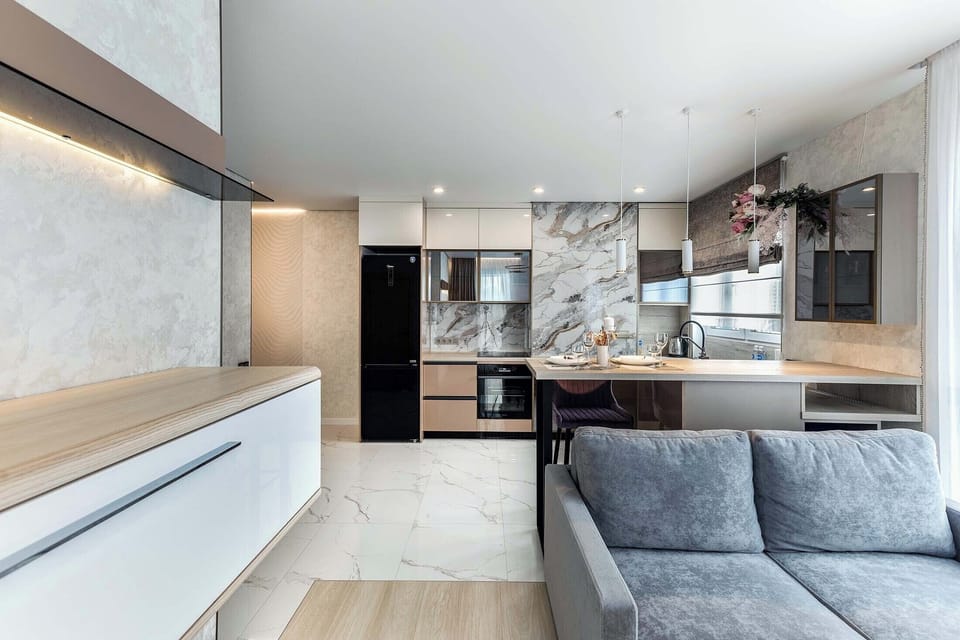 Comfort Apartment, Balcony, City View | Living area | 40-inch flat-screen TV with digital channels