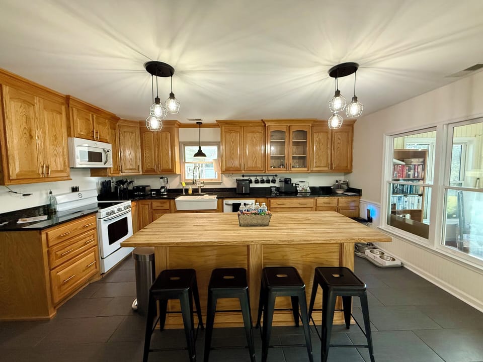 Chefs kitchen with tons of counter space and all the cooking essentials