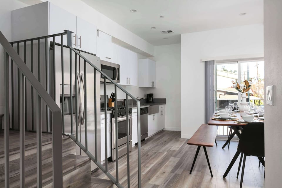 Entryway with staircase and modern interior touches